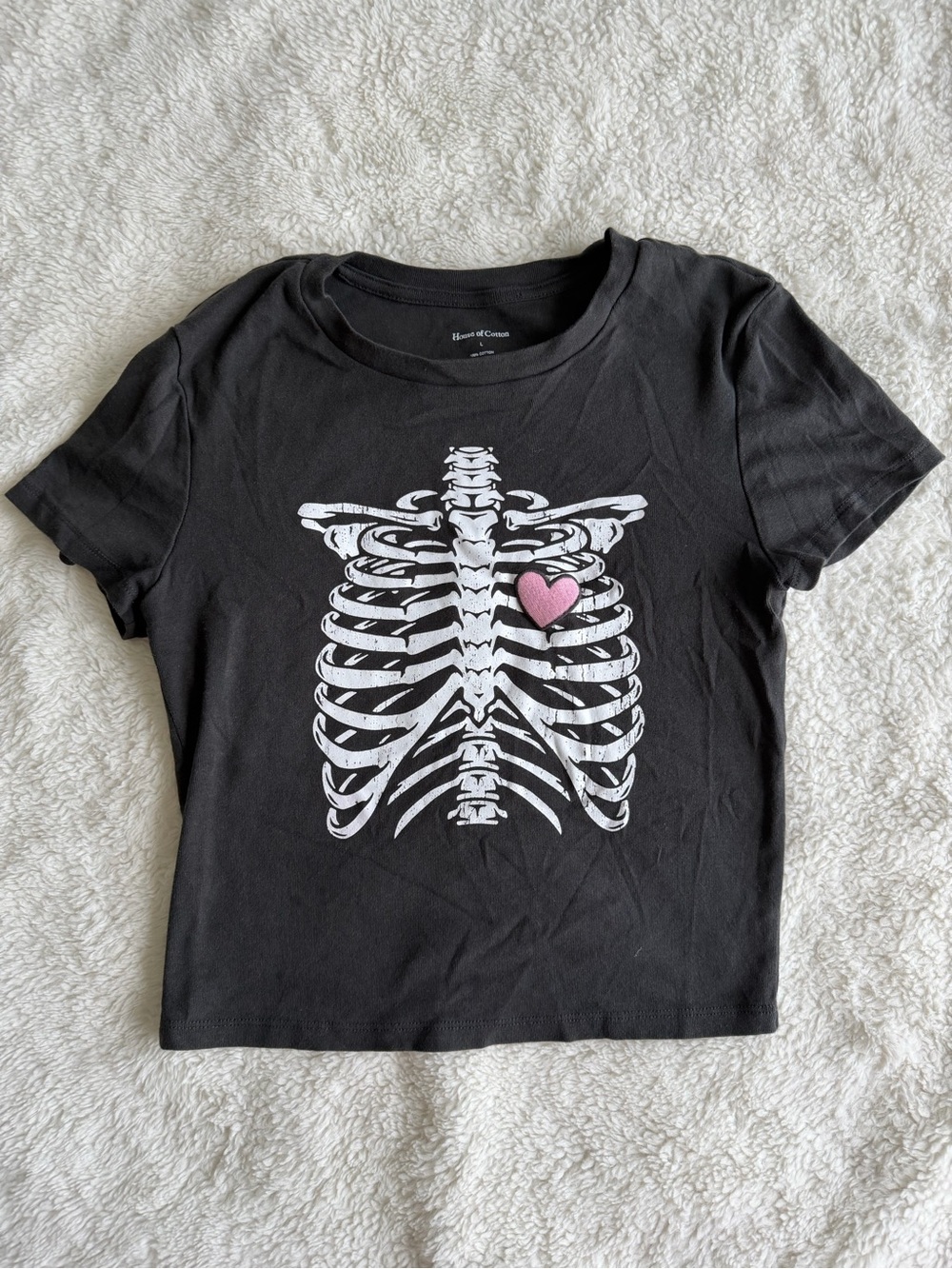 Black Short Sleeve Tee with Ribcage Graphic and Pink Heart Accent